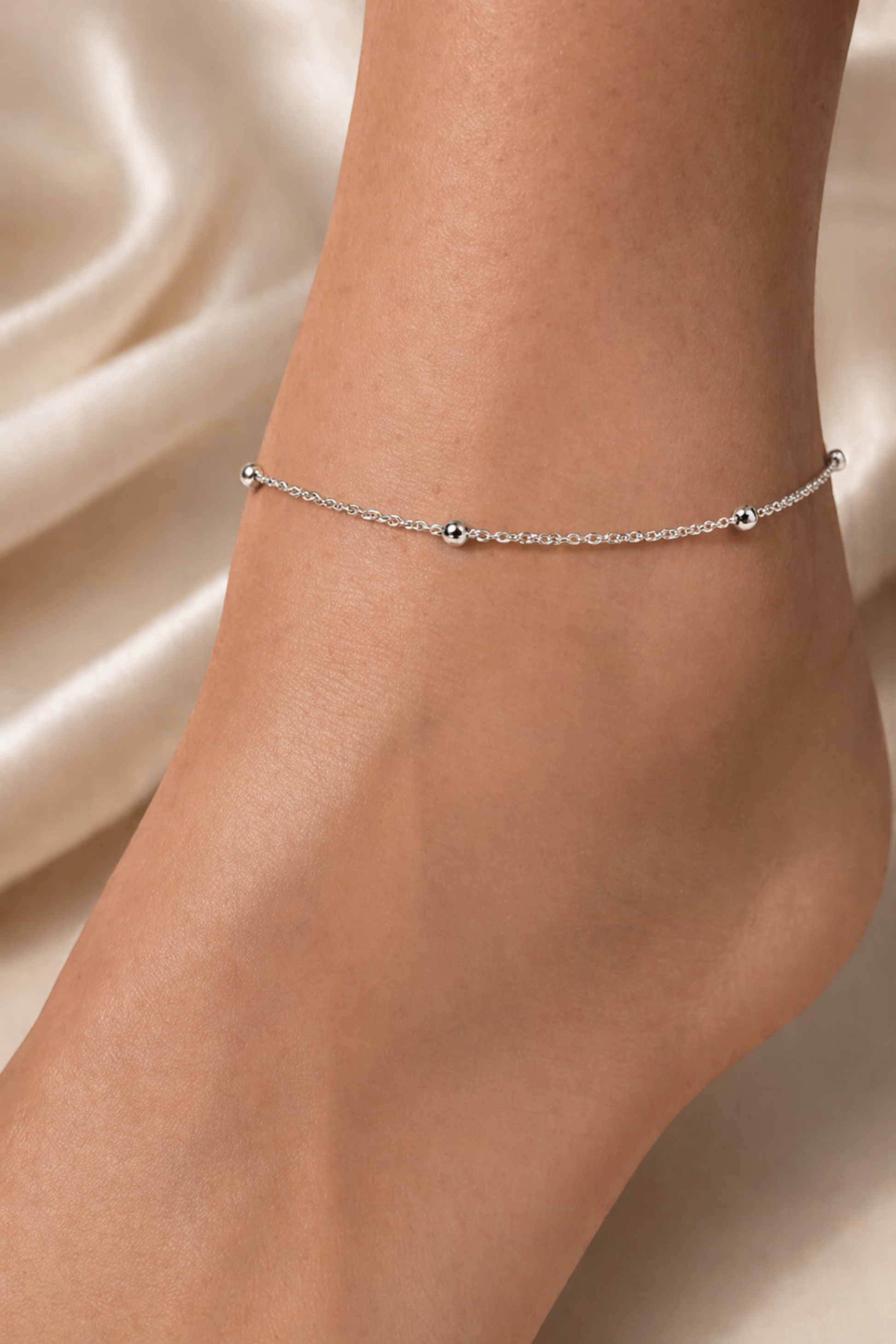 dainty anklet bracelet on foot
