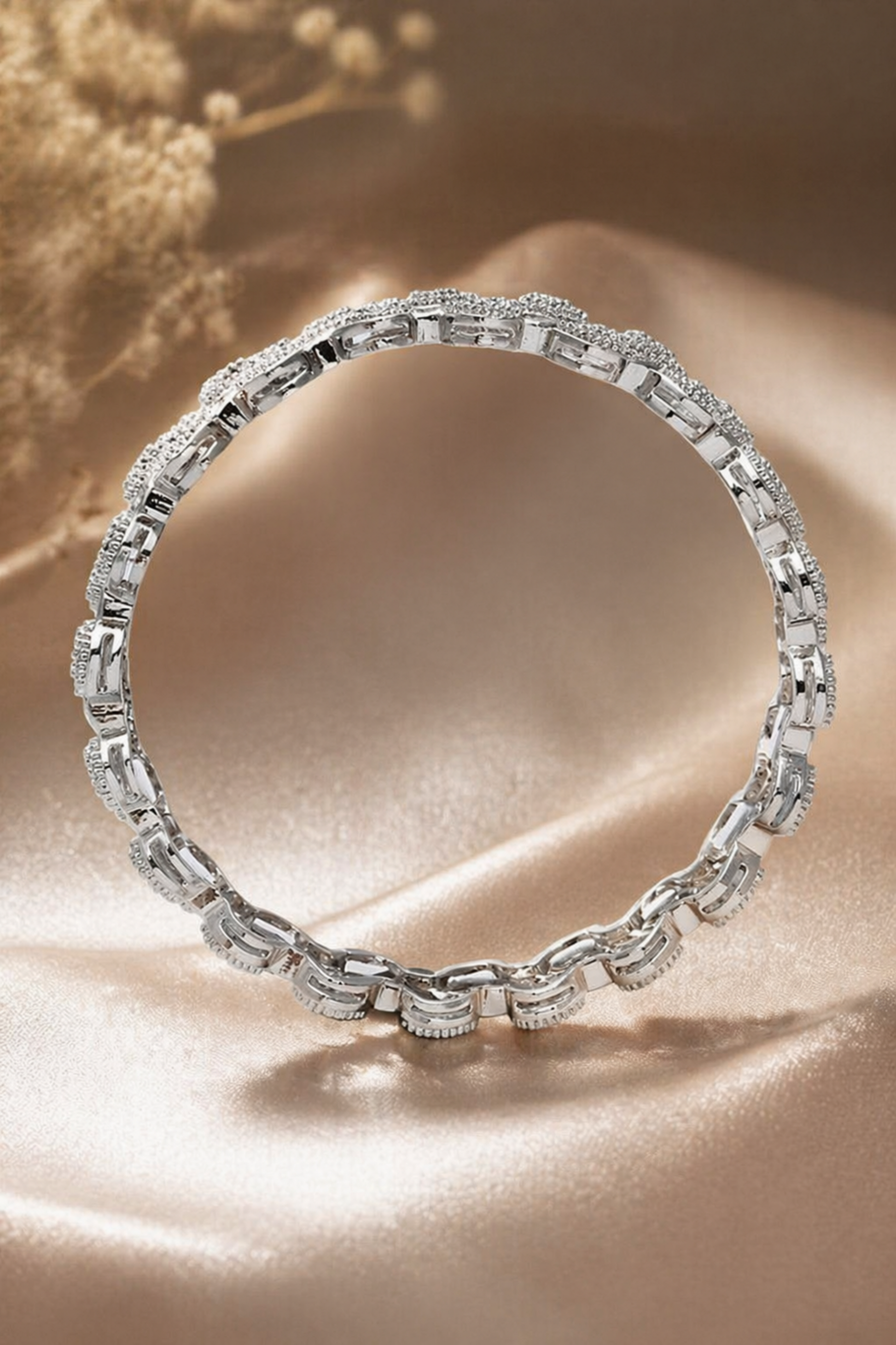 silver tone linked bangle set with textured stones