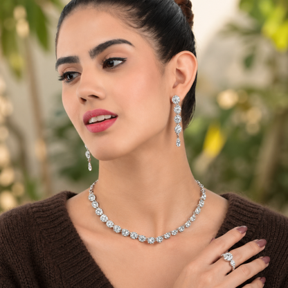 detailed view of polished silver tone jewelry set