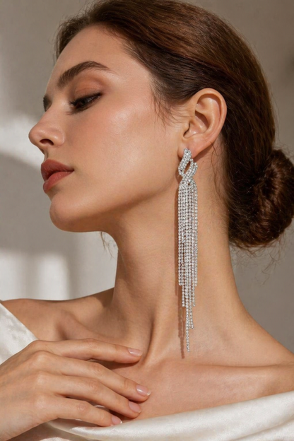 long fringe earrings on model
