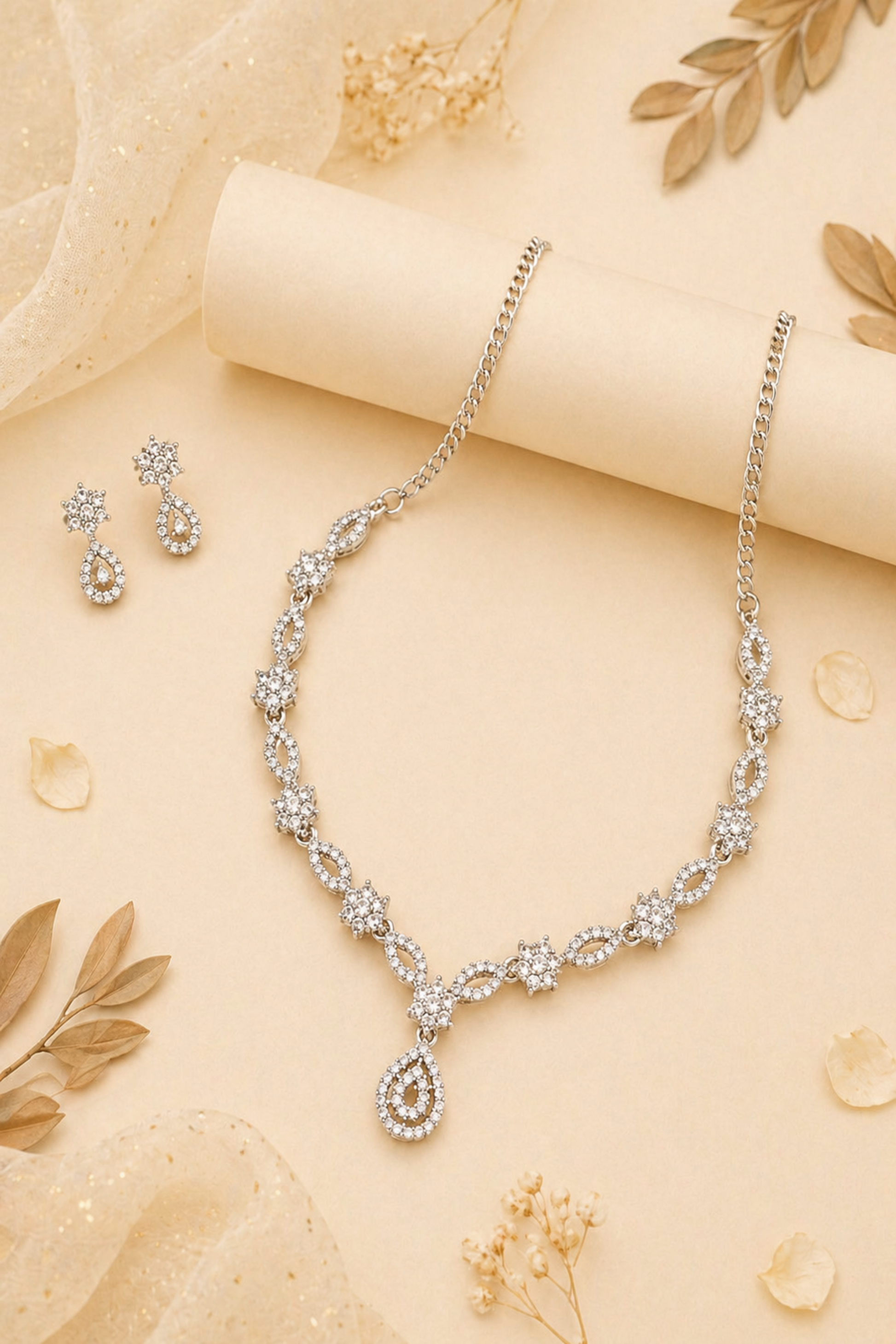 Silver teardrop jewelry set with matching drop earrings