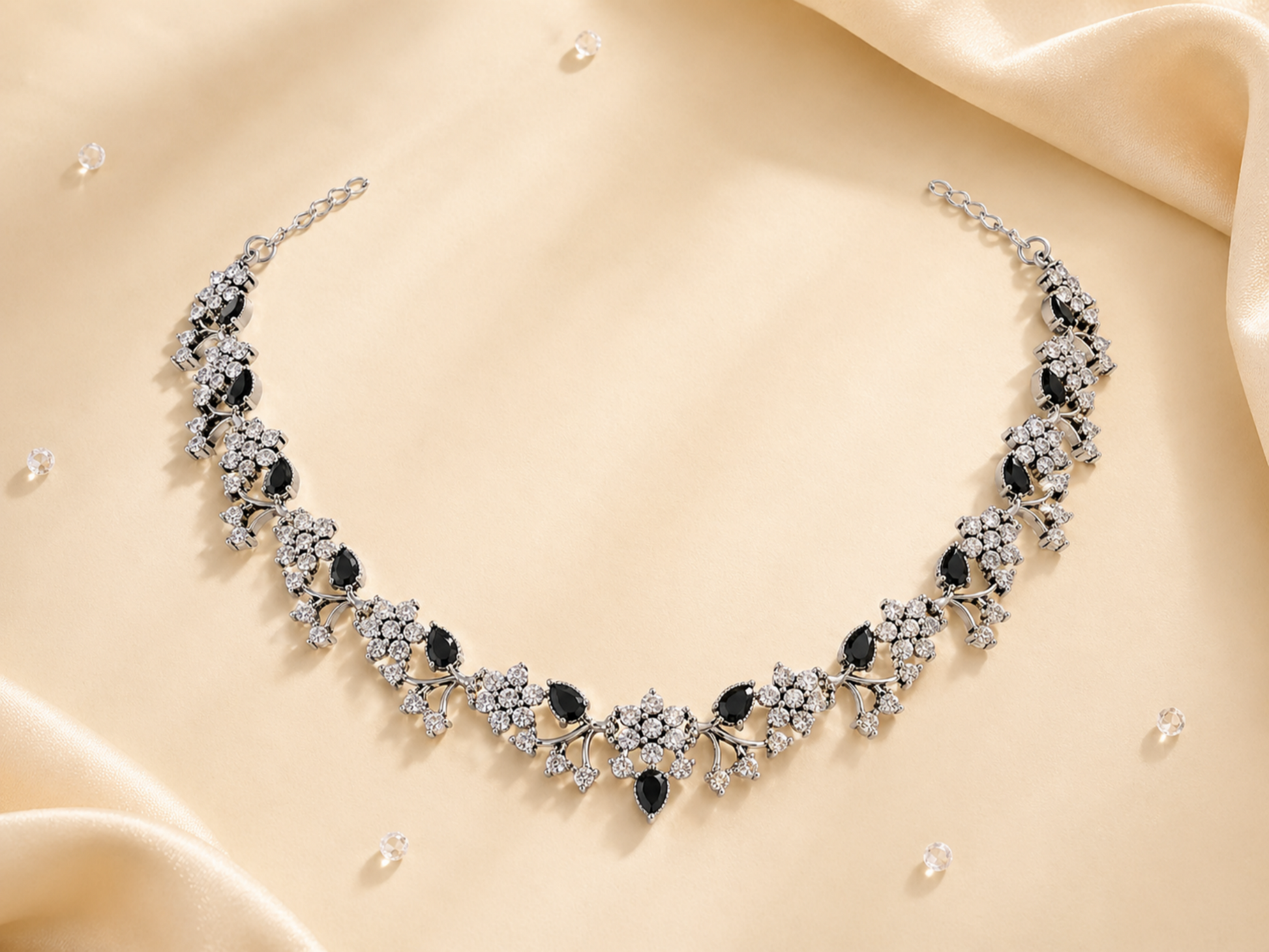 silver tone necklace with black teardrop stones