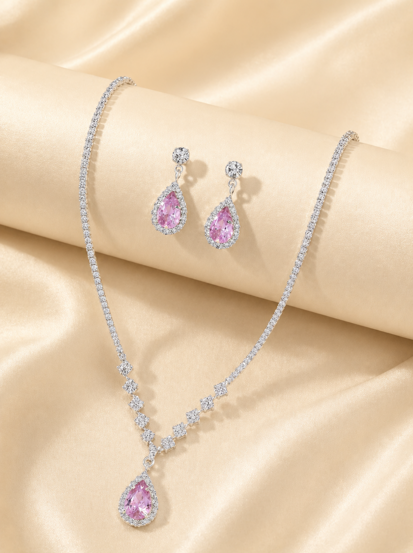 pink pendant necklace styled on neckline