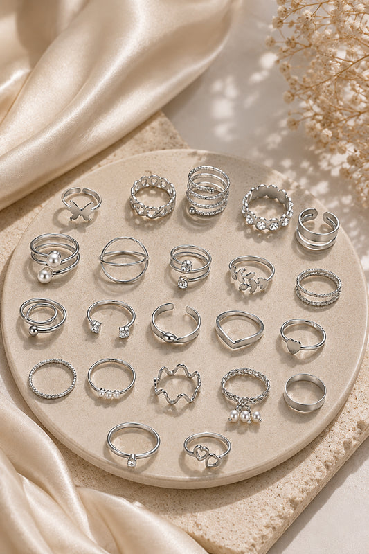 Silver-tone ring set arranged inside a blush velvet tray