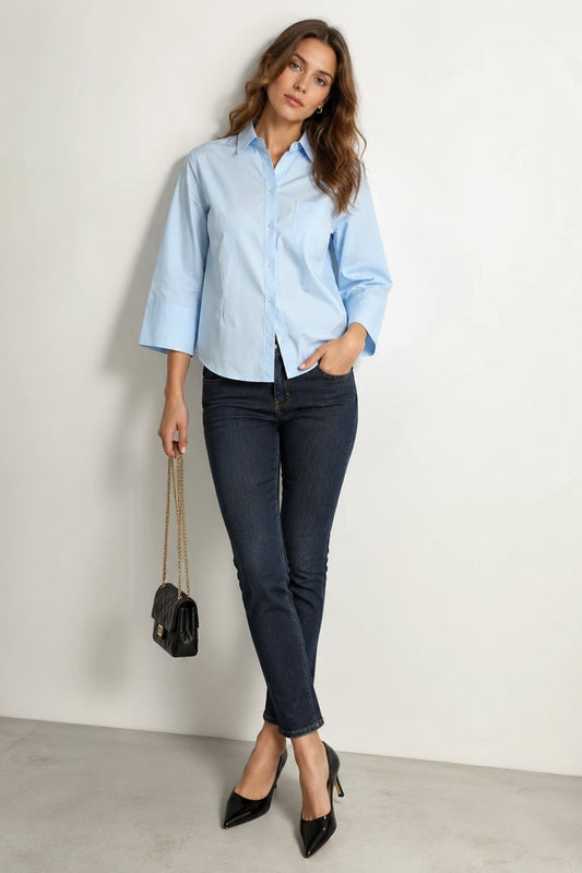 Front view of Sky blue cotton Women's Shirts with button closure