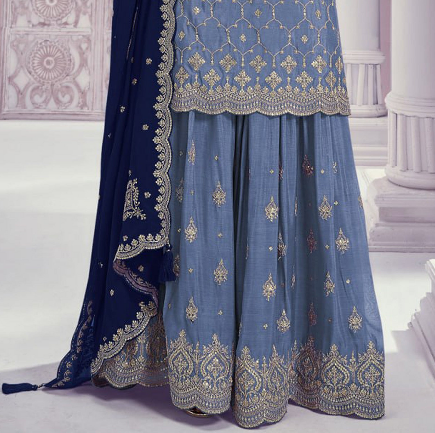 Embroidered neckline detail on sky blue Chinon palazzo suit