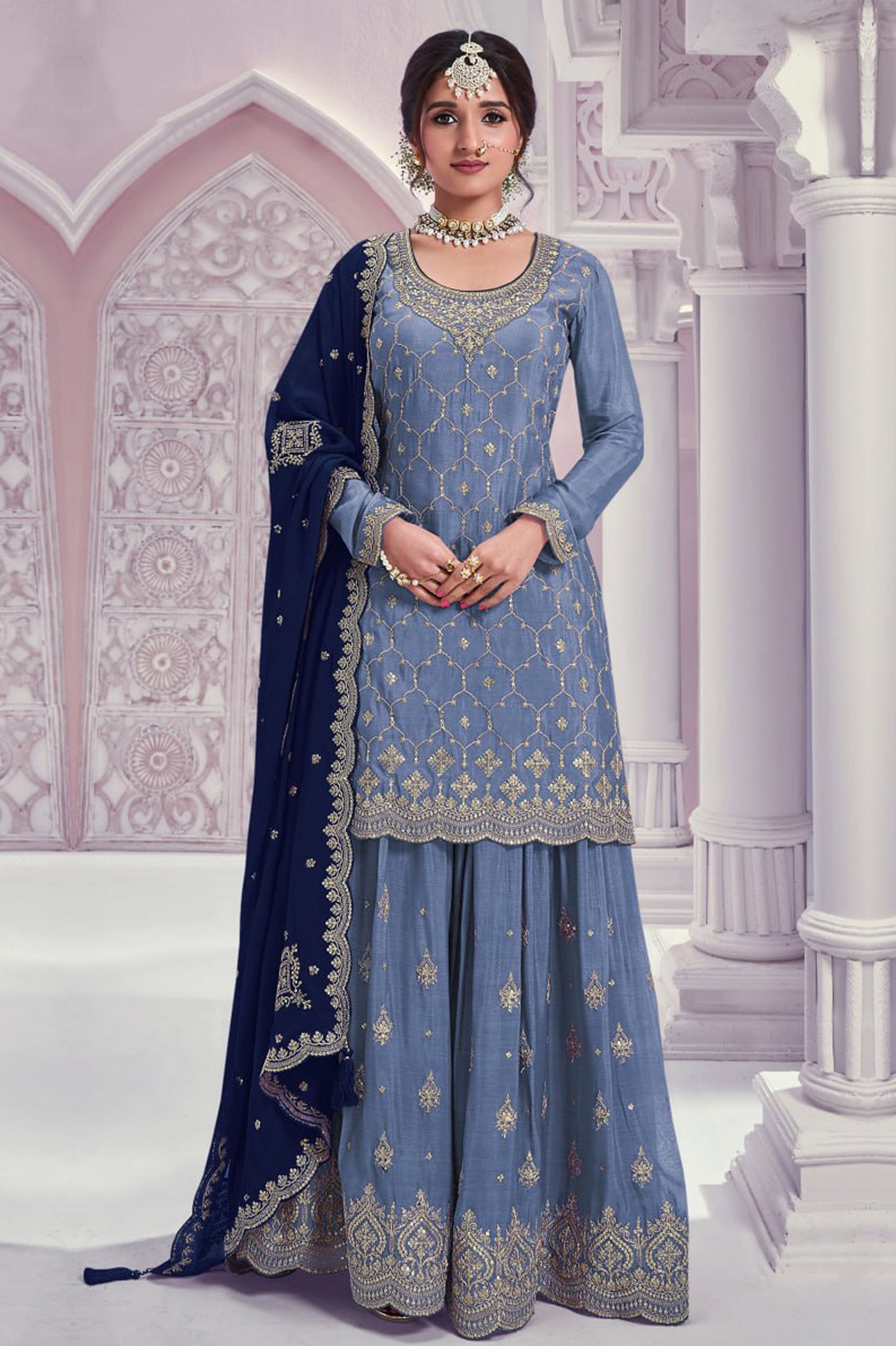 Front view of sky blue embroidered palazzo suit with matching dupatta