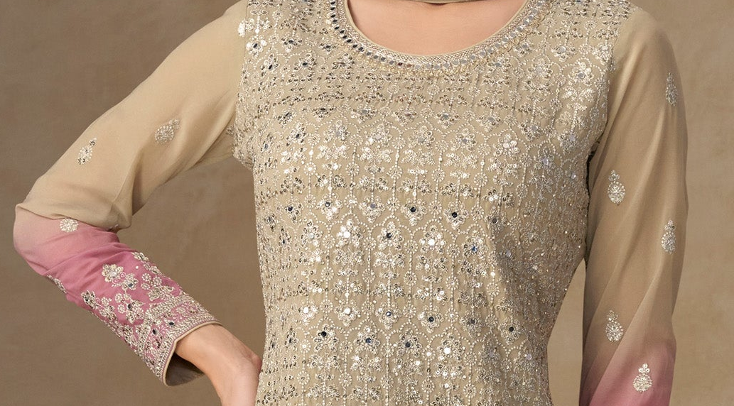 Sleeve embroidery detail on beige suit