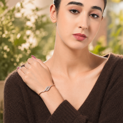 woman wearing slim leaf bracelet on wrist