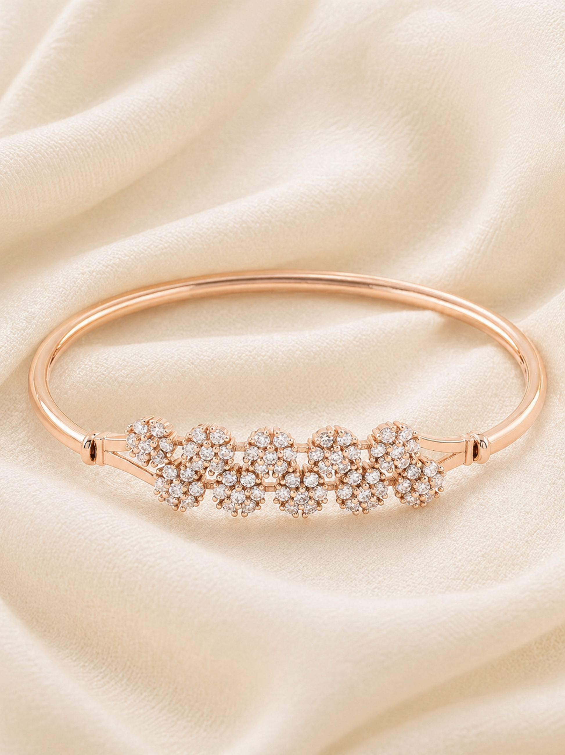 slim metal bracelet with central flower design