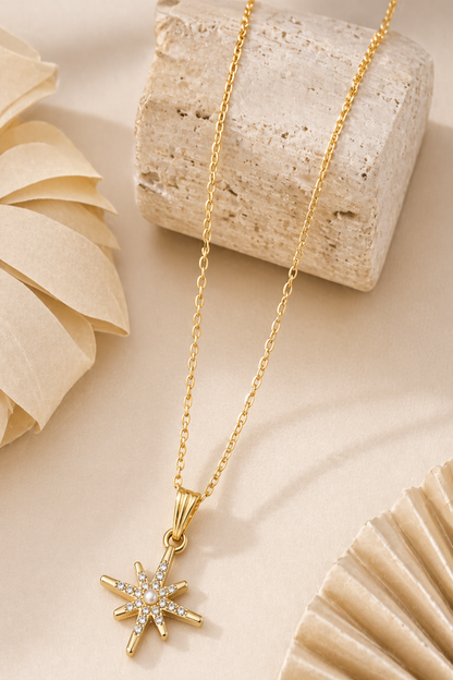 gold star pendant necklace close-up