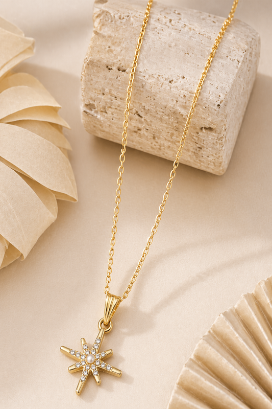 gold star pendant necklace close-up