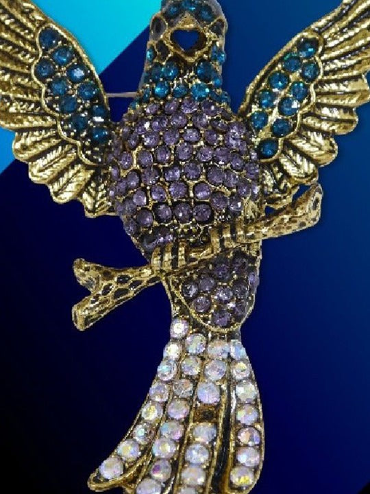statement bird brooch with spread wings design