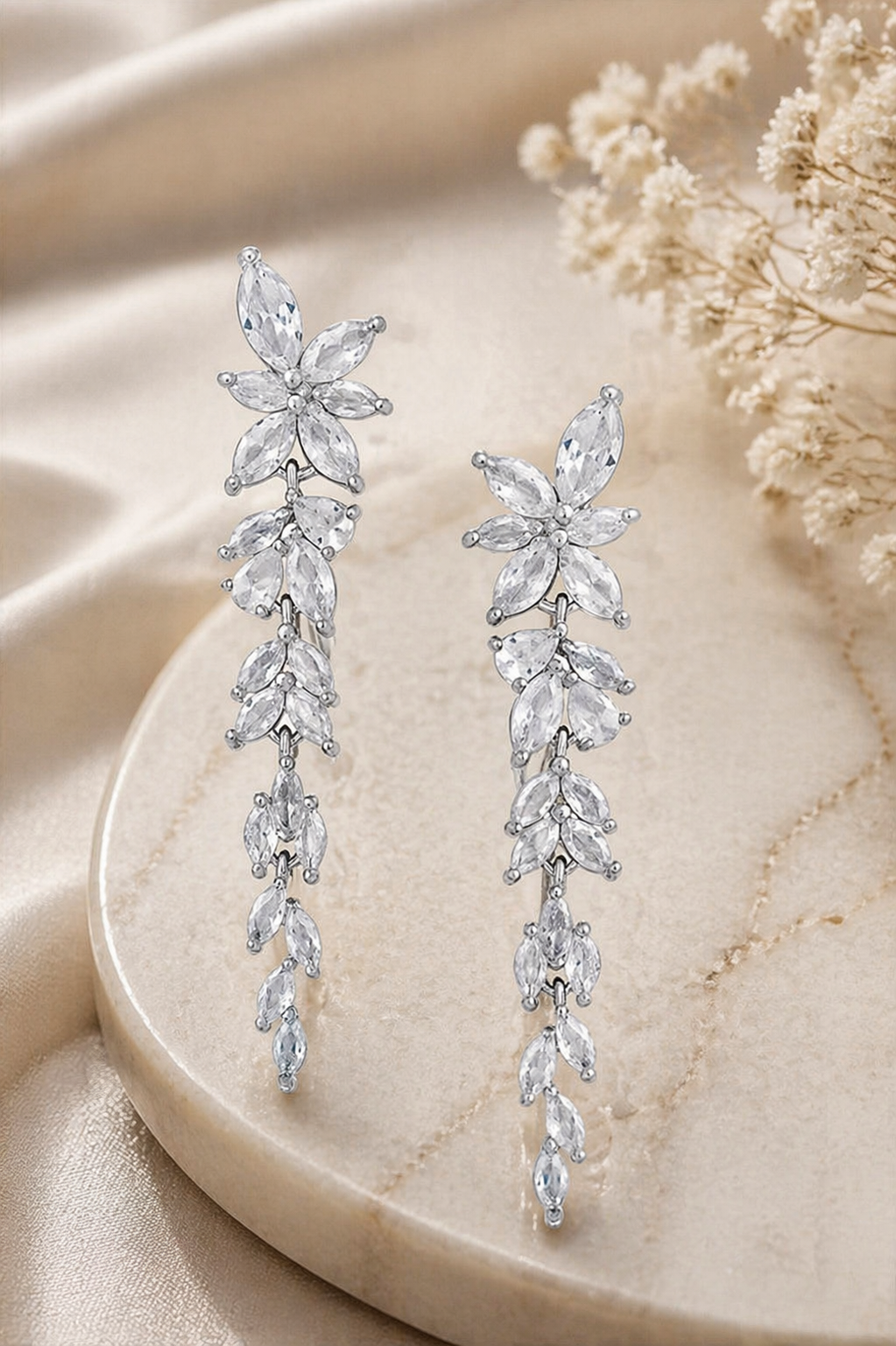 close up silver marquise crystal leaf earrings long cascading drop design high shine rhodium plated finish
