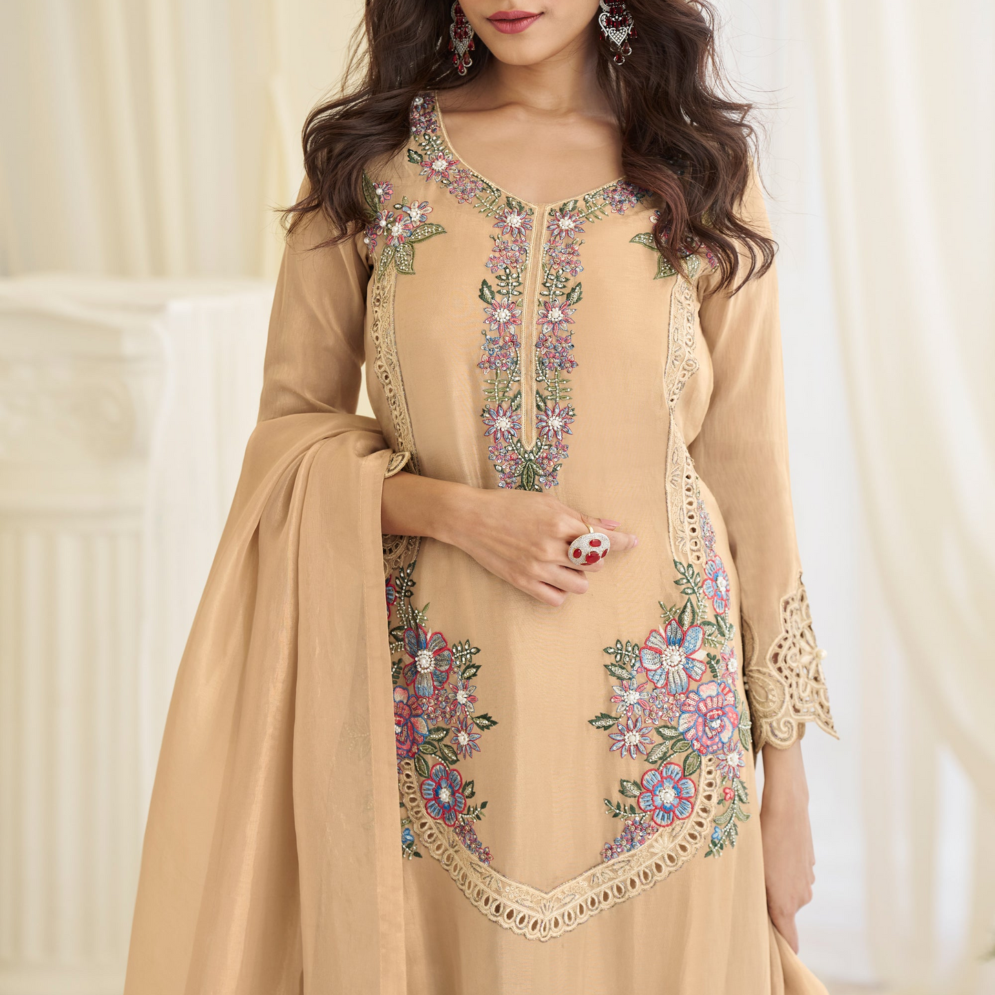Straight kameez paired with sharara in beige color
