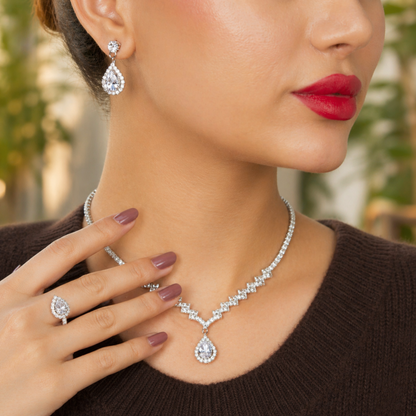 Close view of polished silver tone pendant necklace
