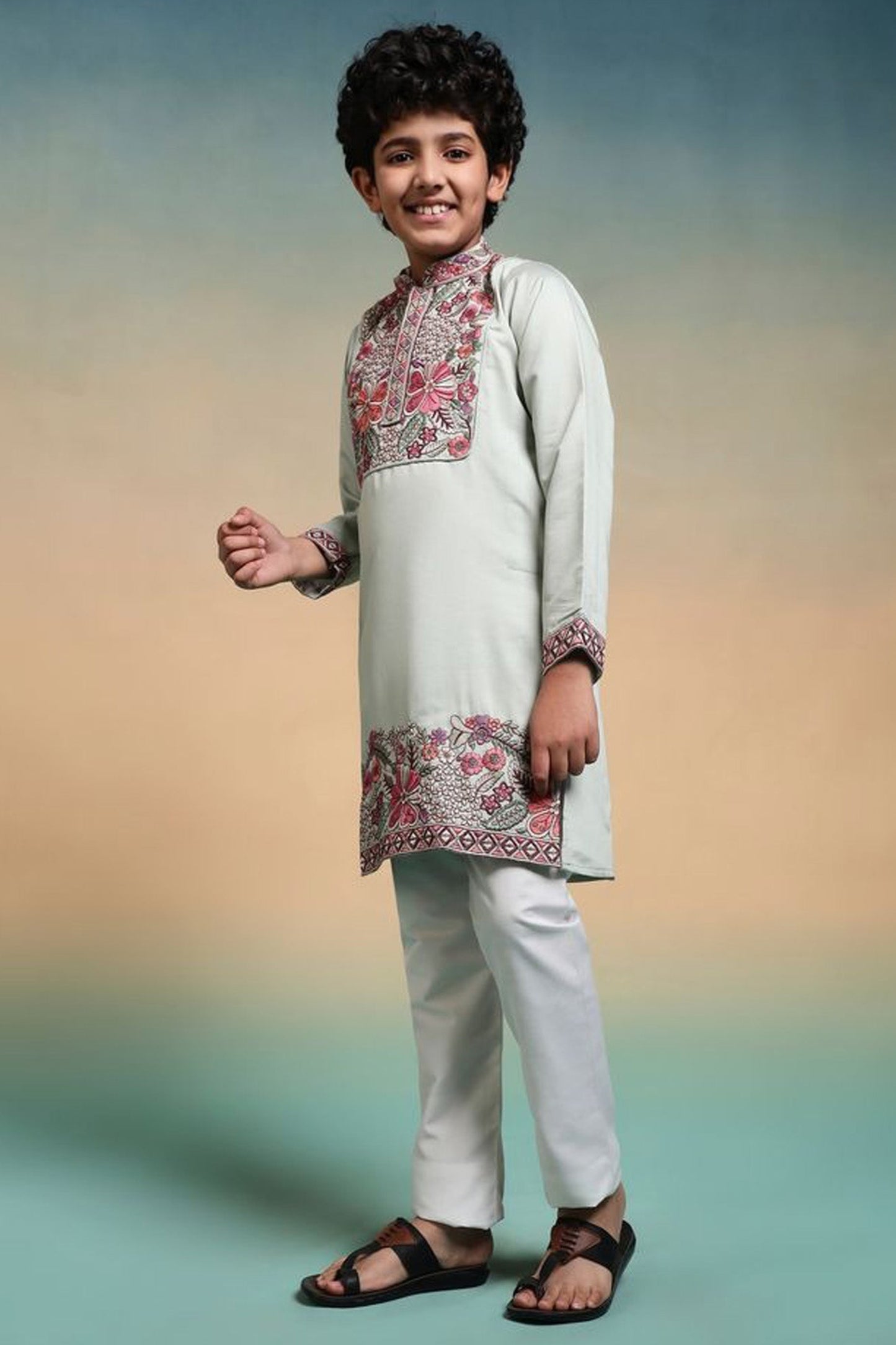 Side view of pistachio green kurta with sequence embroidery