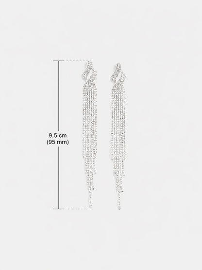 crystal tassel earrings flat lay

