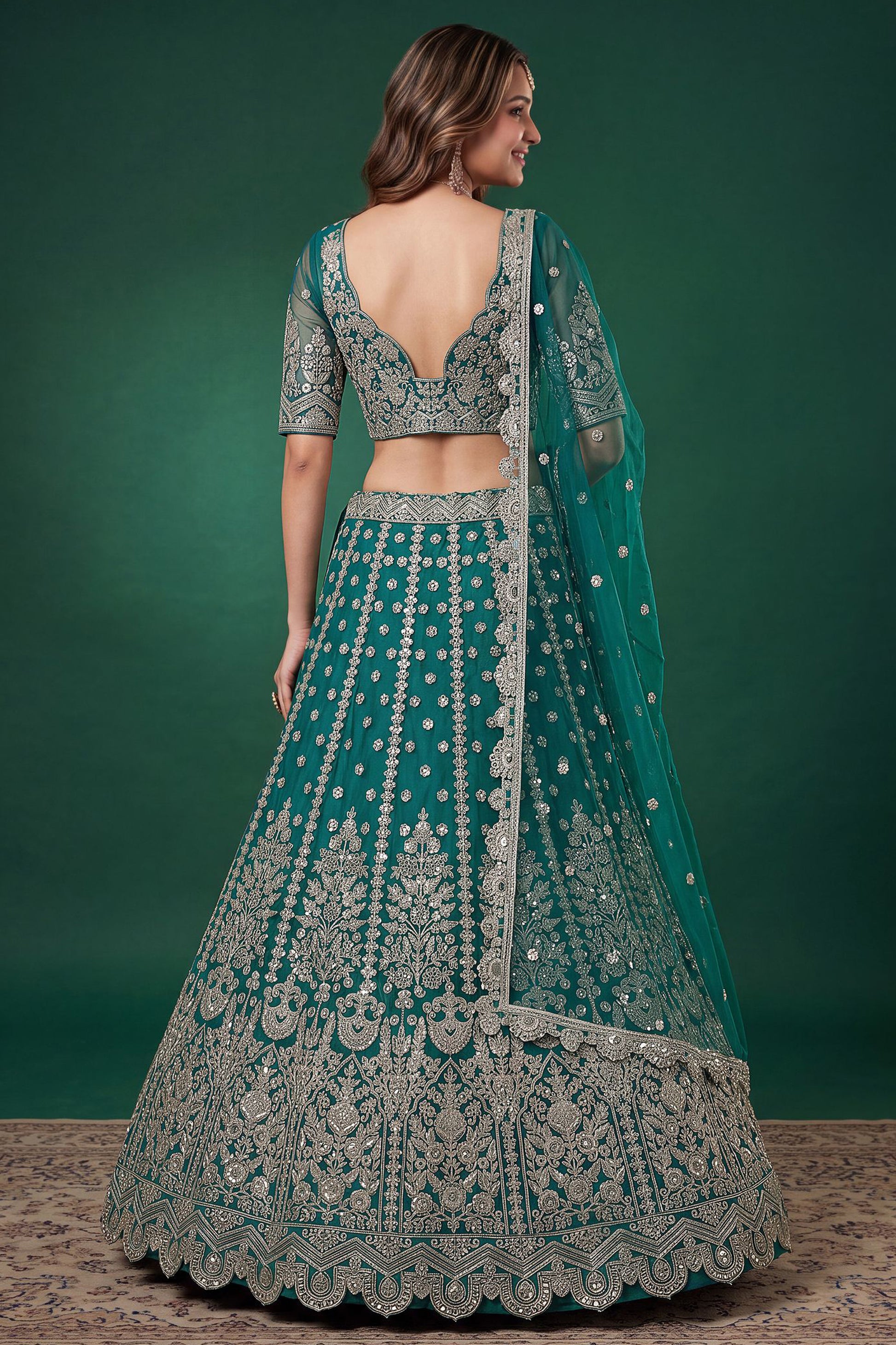 Teal blue lehenga choli with Zari and Dori embroidery