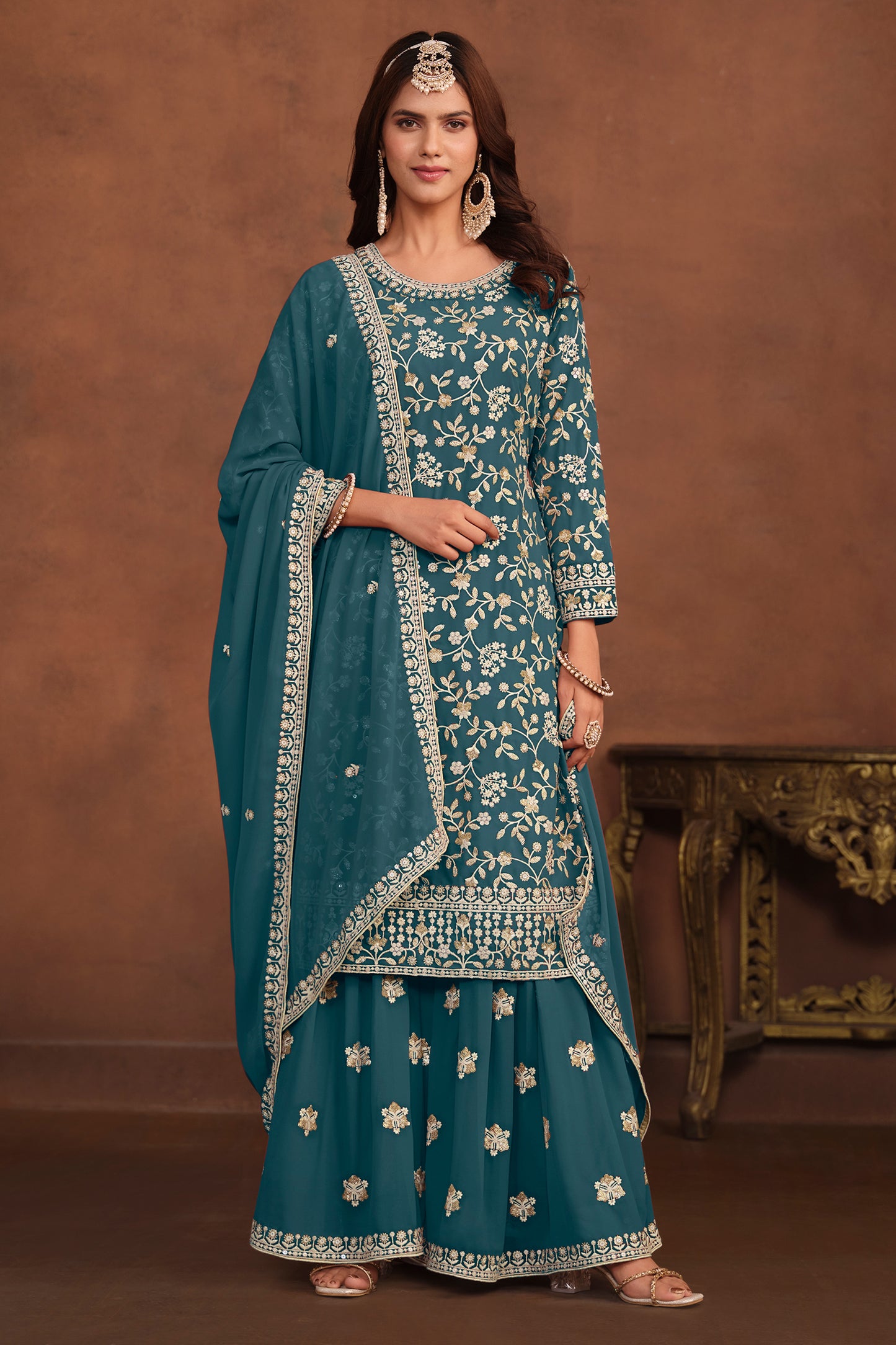Front view of teal blue palazzo dupatt dress with embroidery