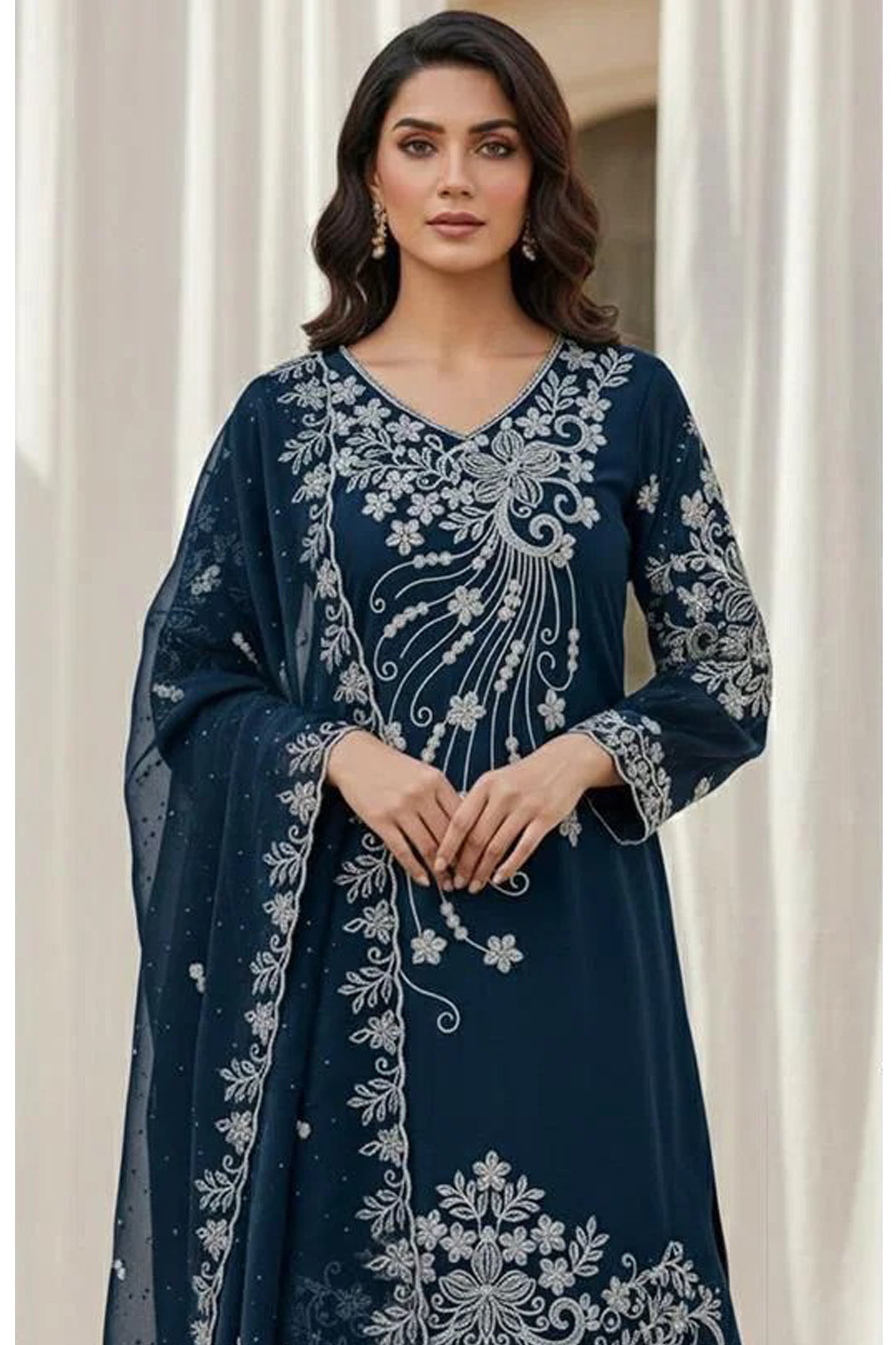 Front view of teal blue palazzo outfit in Hevay Georgette