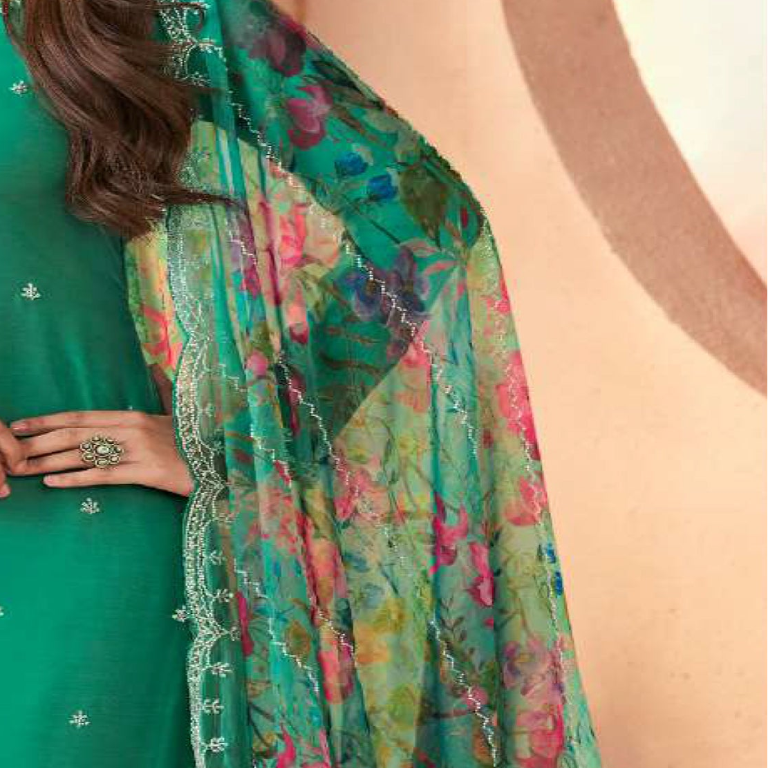 Teal salwar kameez top with intricate embroidery work