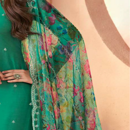 Teal salwar kameez top with intricate embroidery work