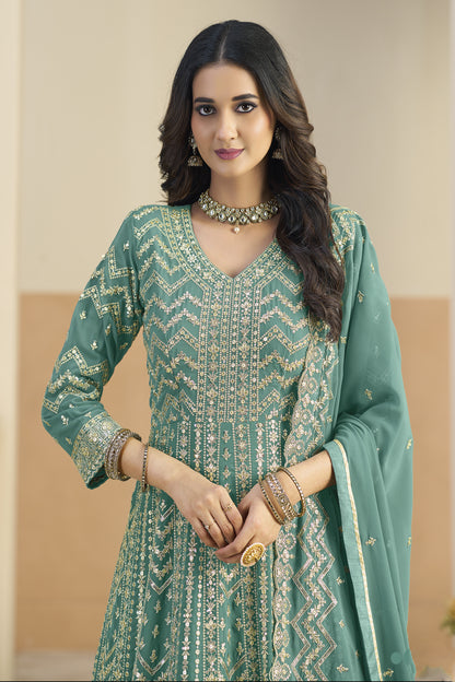 Teal green Anarkali dress with heavy embroidery work