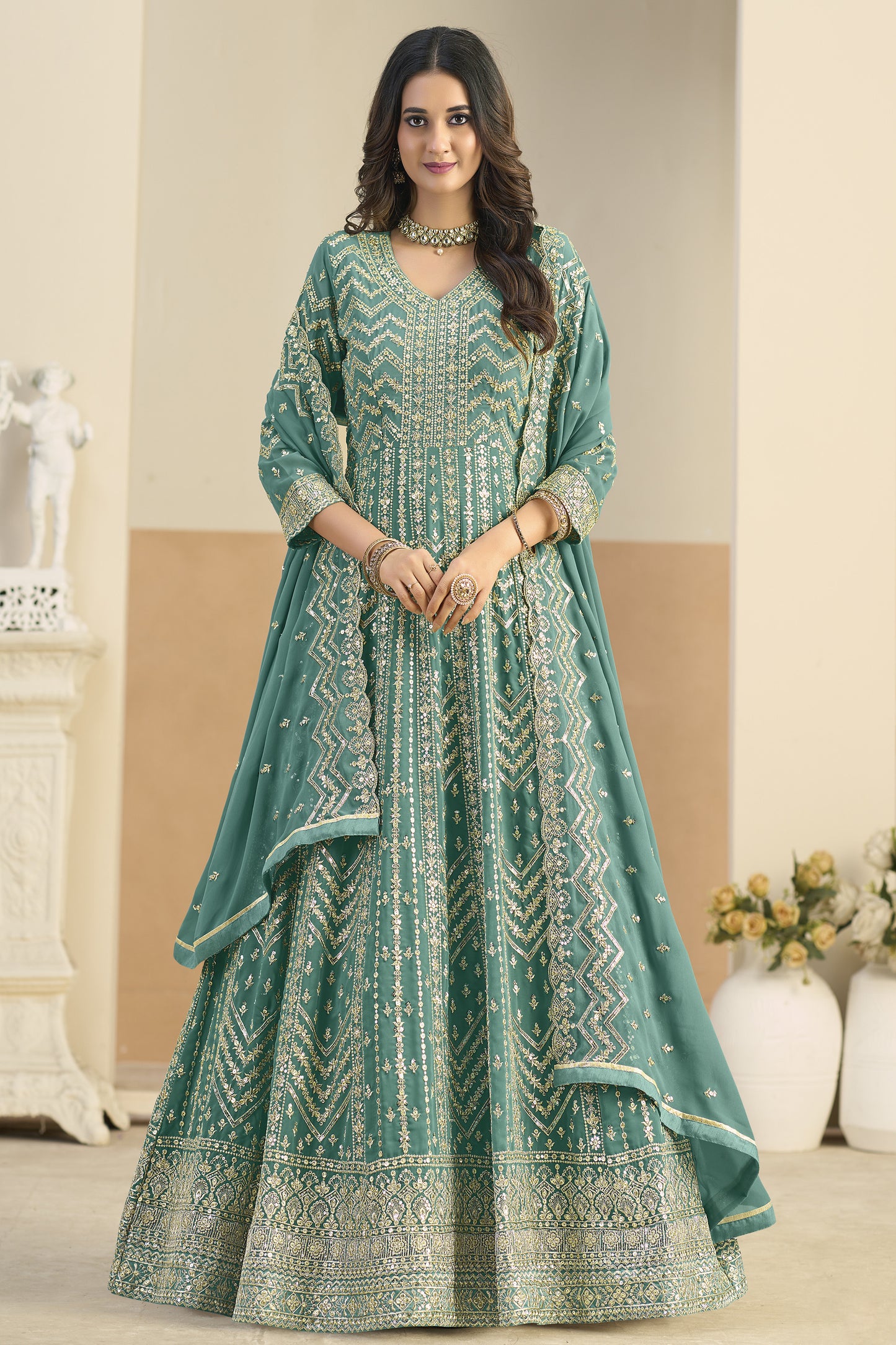 Teal green Anarkali dress with heavy embroidery work
