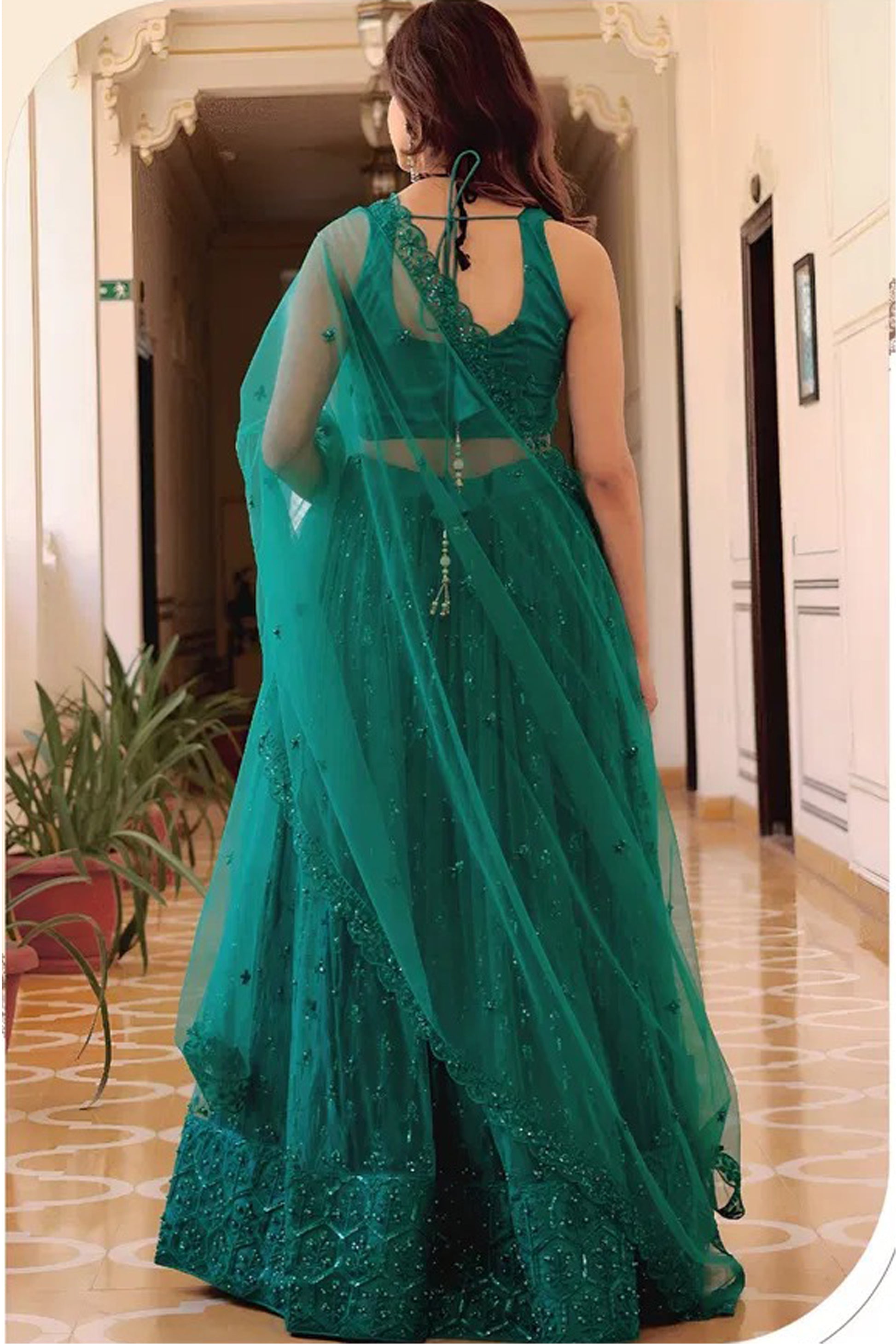 Teal Green Lehenga Choli with thread and sequins embroidery