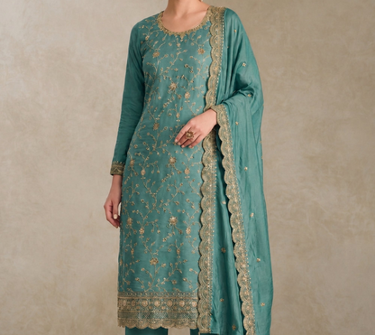 Front view of Dizain Salwar Kameez in teal green shade
