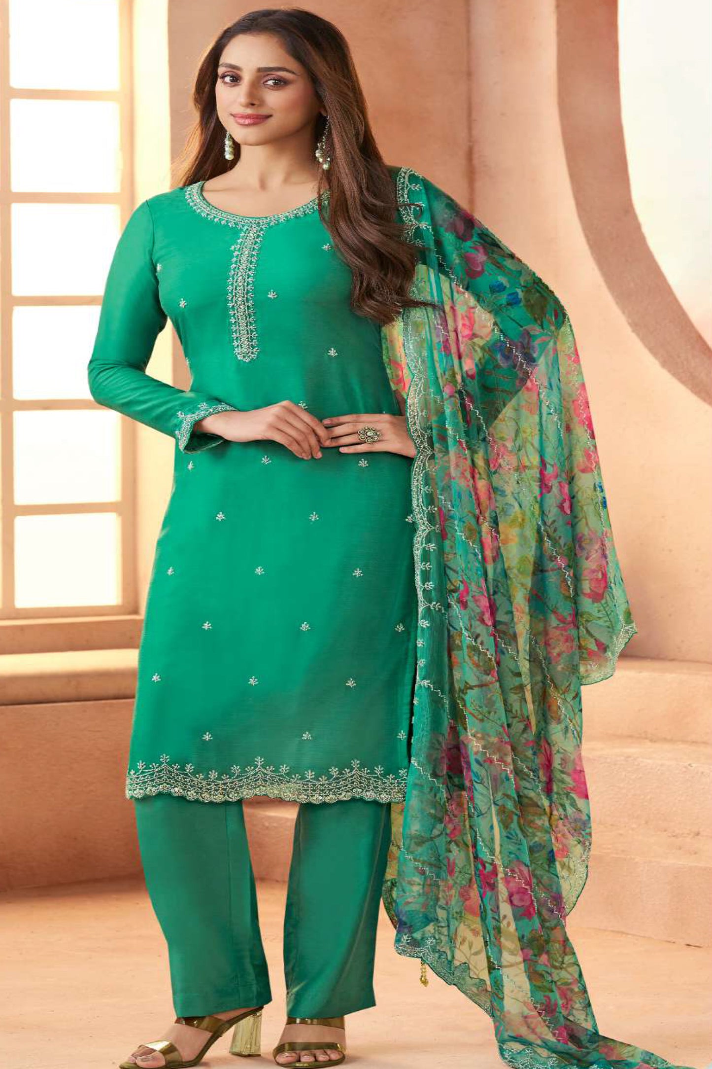 Contemporary salwar suits style teal embroidered outfit