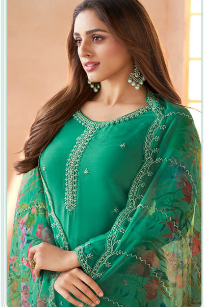 Teal Chinon salwar kameez with heavy embroidery design