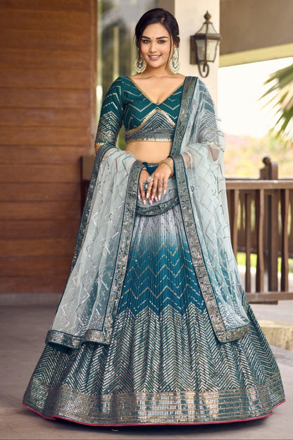 Teal lehenga designs for wedding front view with embroidery