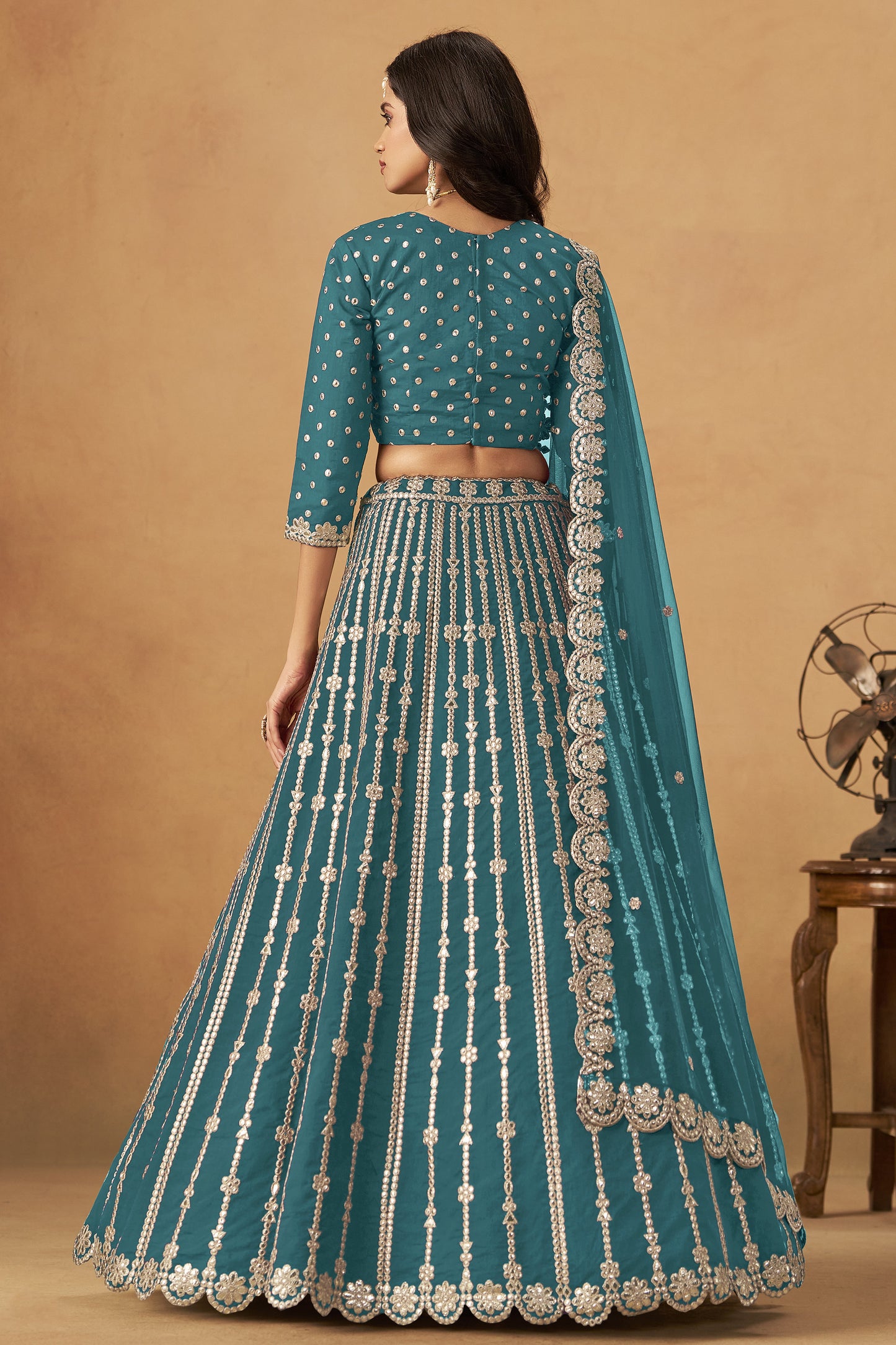 ready to wear teal lehenga side angle
