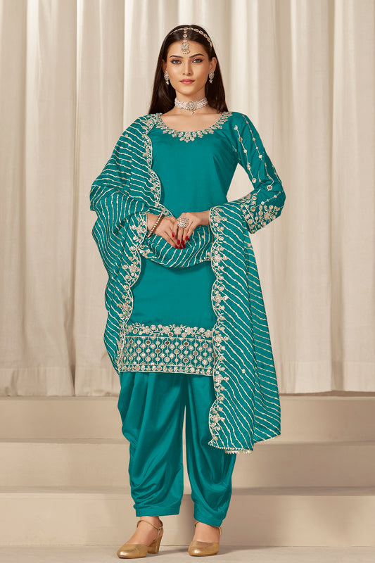 Front view of teal blue patiala with embroidery and mirror work