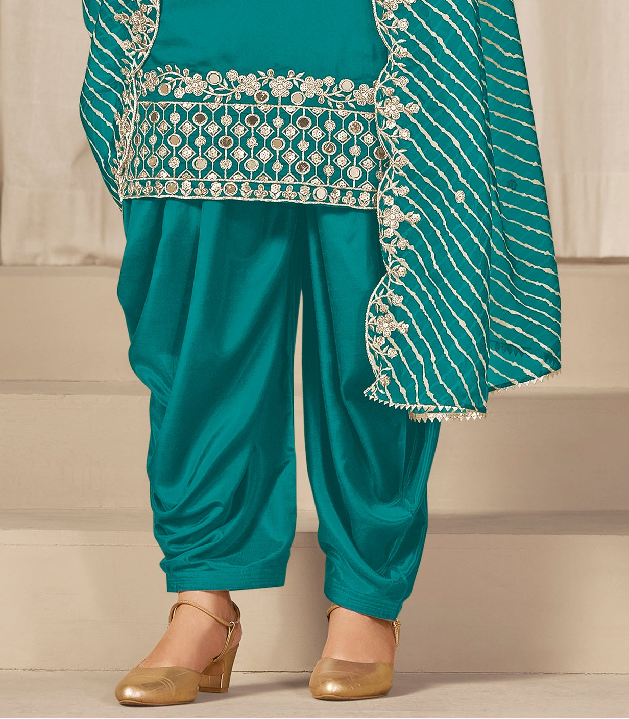Indian patiala pants styled with teal salwar suit