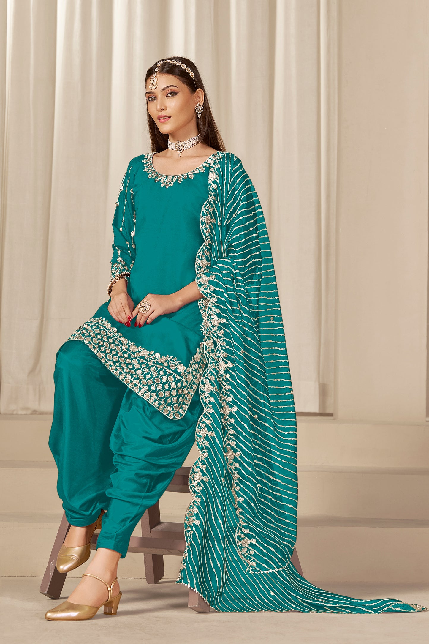 Sleeve detail on teal blue patiala suit