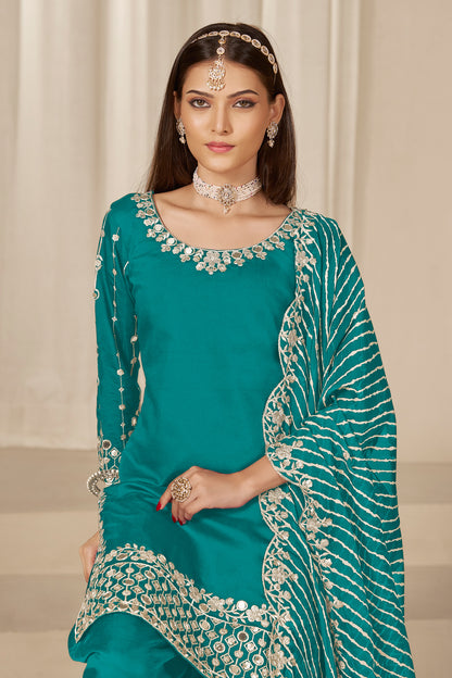 Close-up of embroidery on Roman silk top of teal patiala
