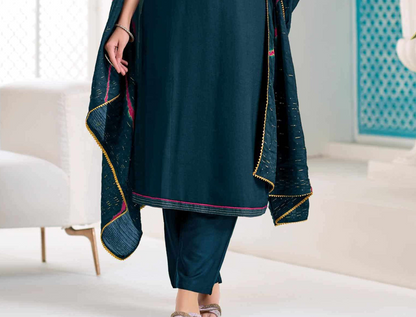 teal salwar set hanging display studio capture