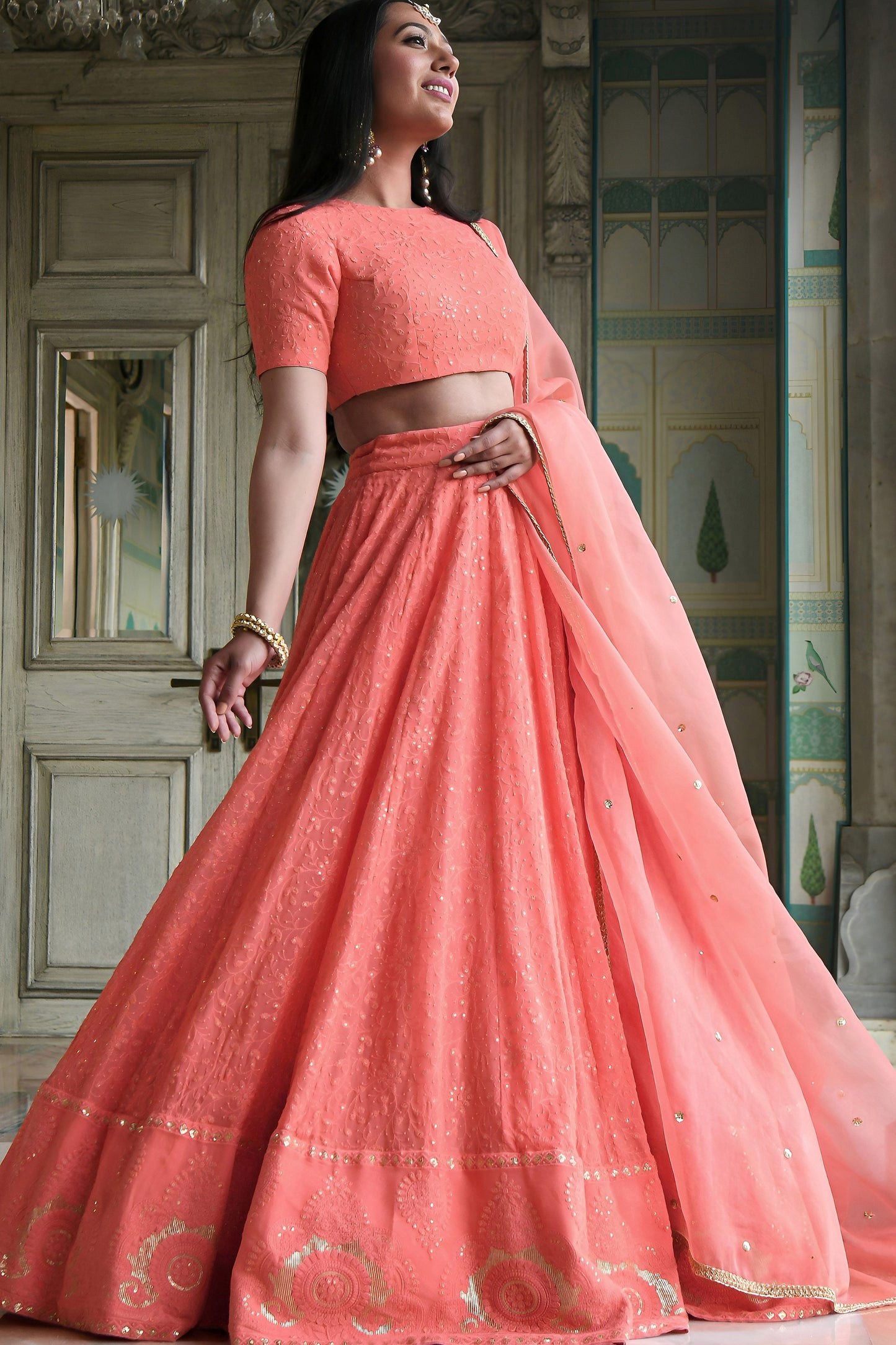 Peach Lehenga Choli styled for Sangeet Night celebration