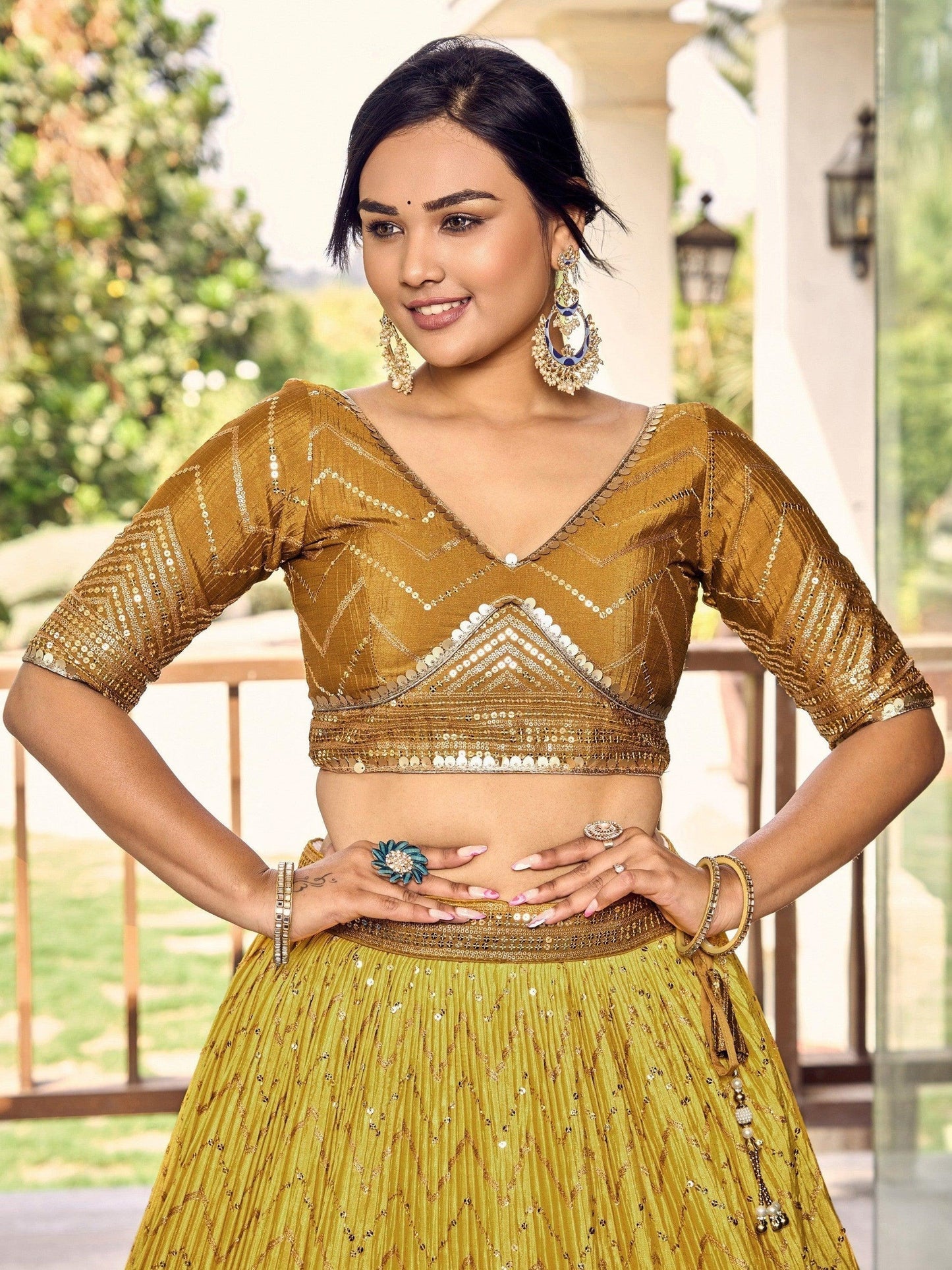 Close-up of sequins work on chinon lehenga fabric