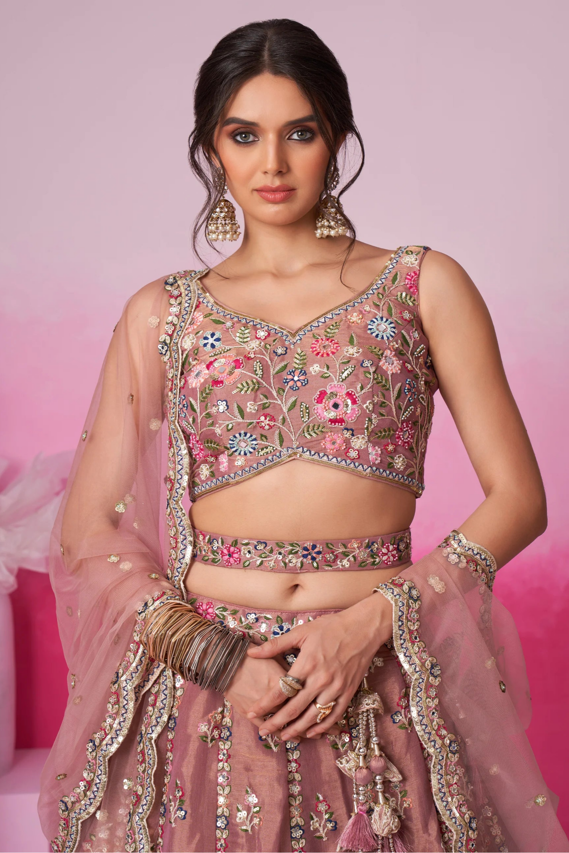 silk Brown lehenga choli detailed thread embroidery close-up
