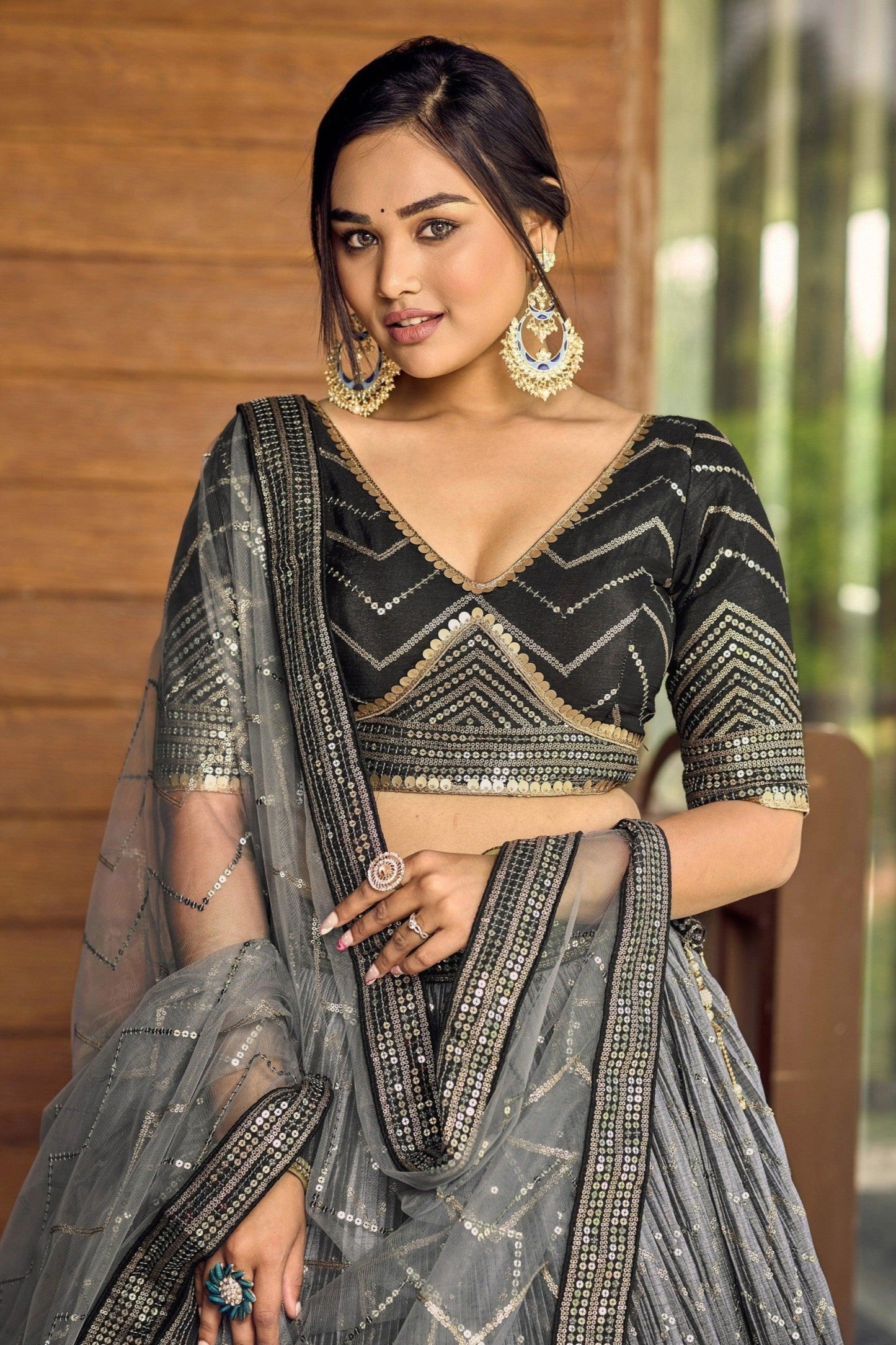 Close-up of thread embroidery and sequins detailing