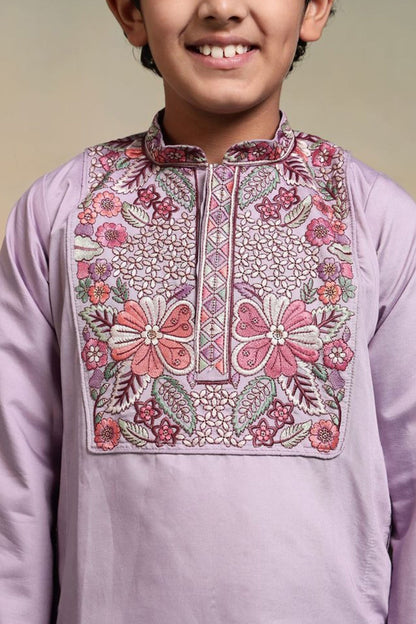 Close view of thread and sequence embroidered work on boys kurta