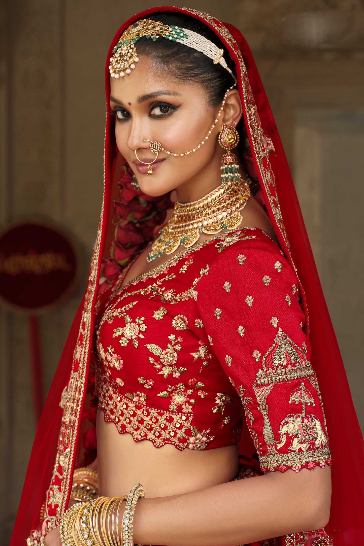 bridal lehenga choli maroon thread work close up