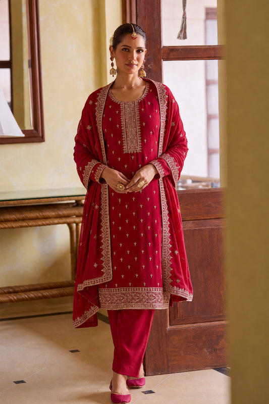Traditional embroidery work on red georgette outfit