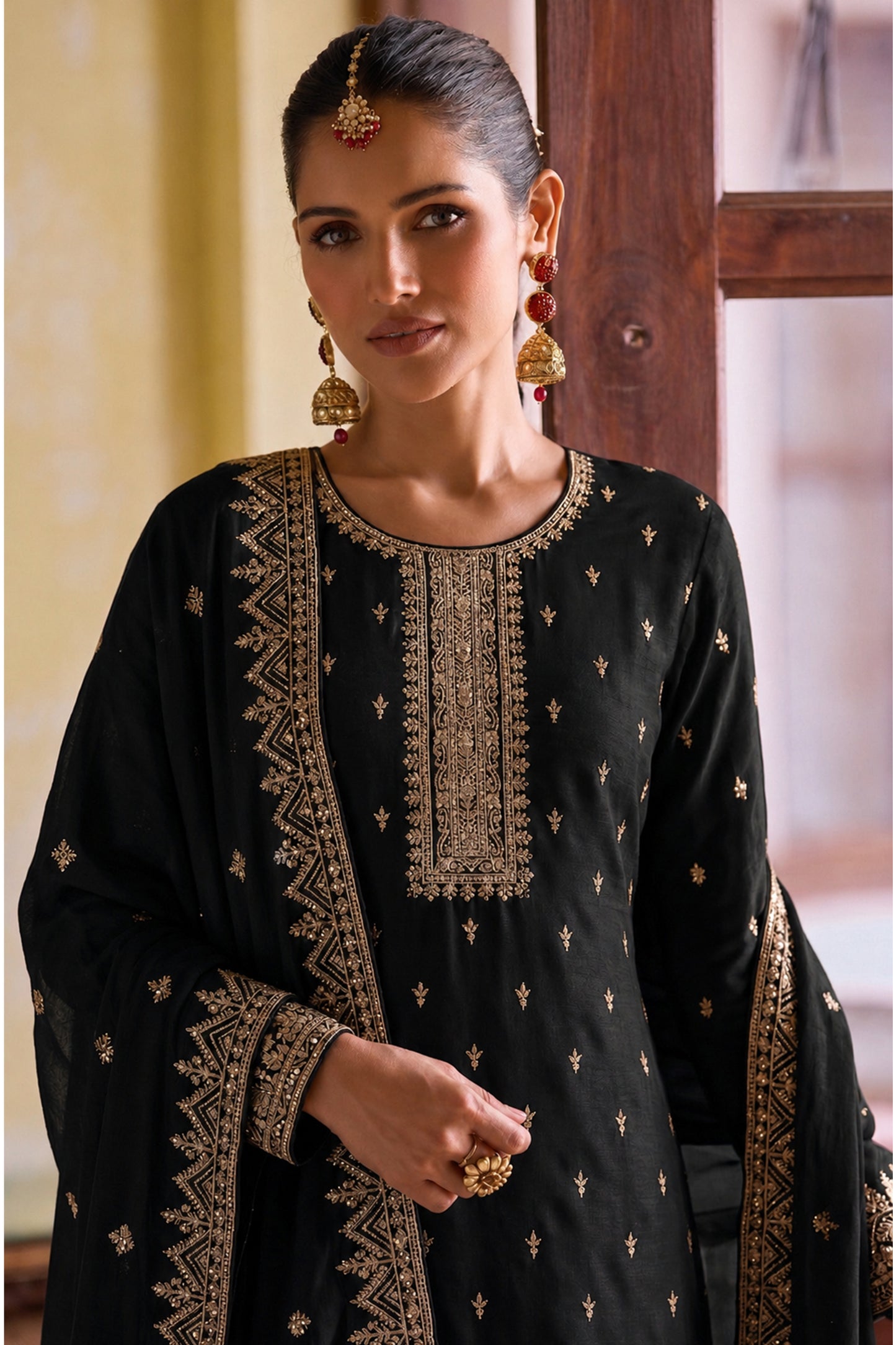 Traditional embroidery detail on black salwar outfit