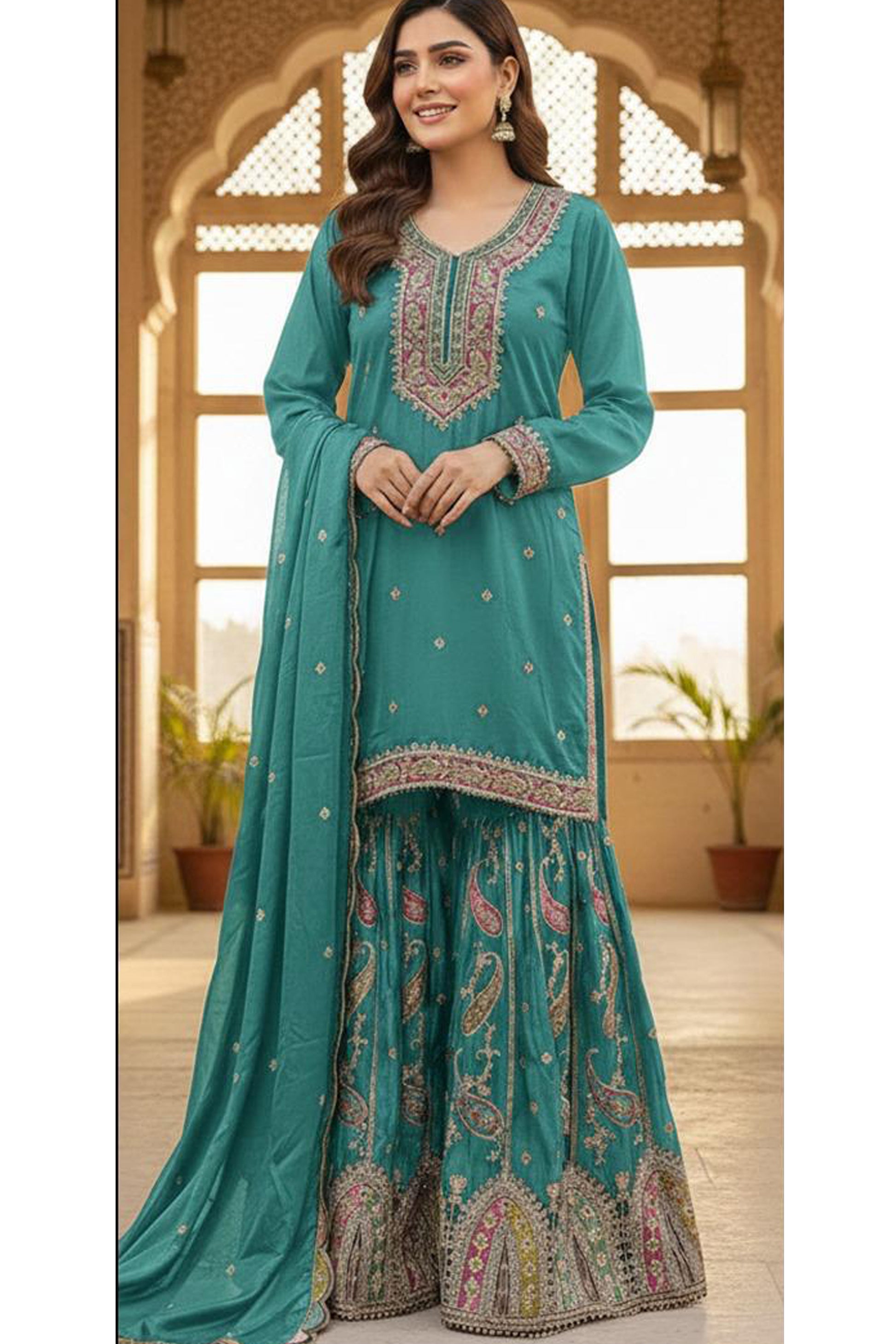 Traditional Indian Dress in teal blue with fancy Embroidery work