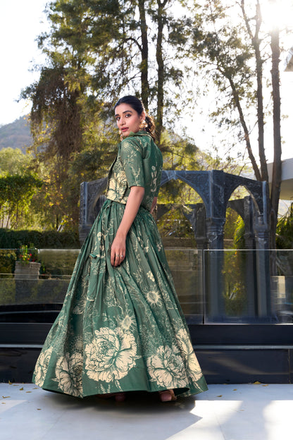 Side angle view of olive green printed lehenga with stitched blouse